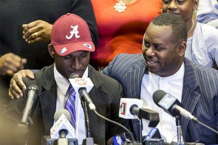 Rashaan Evans and his father at his announcement