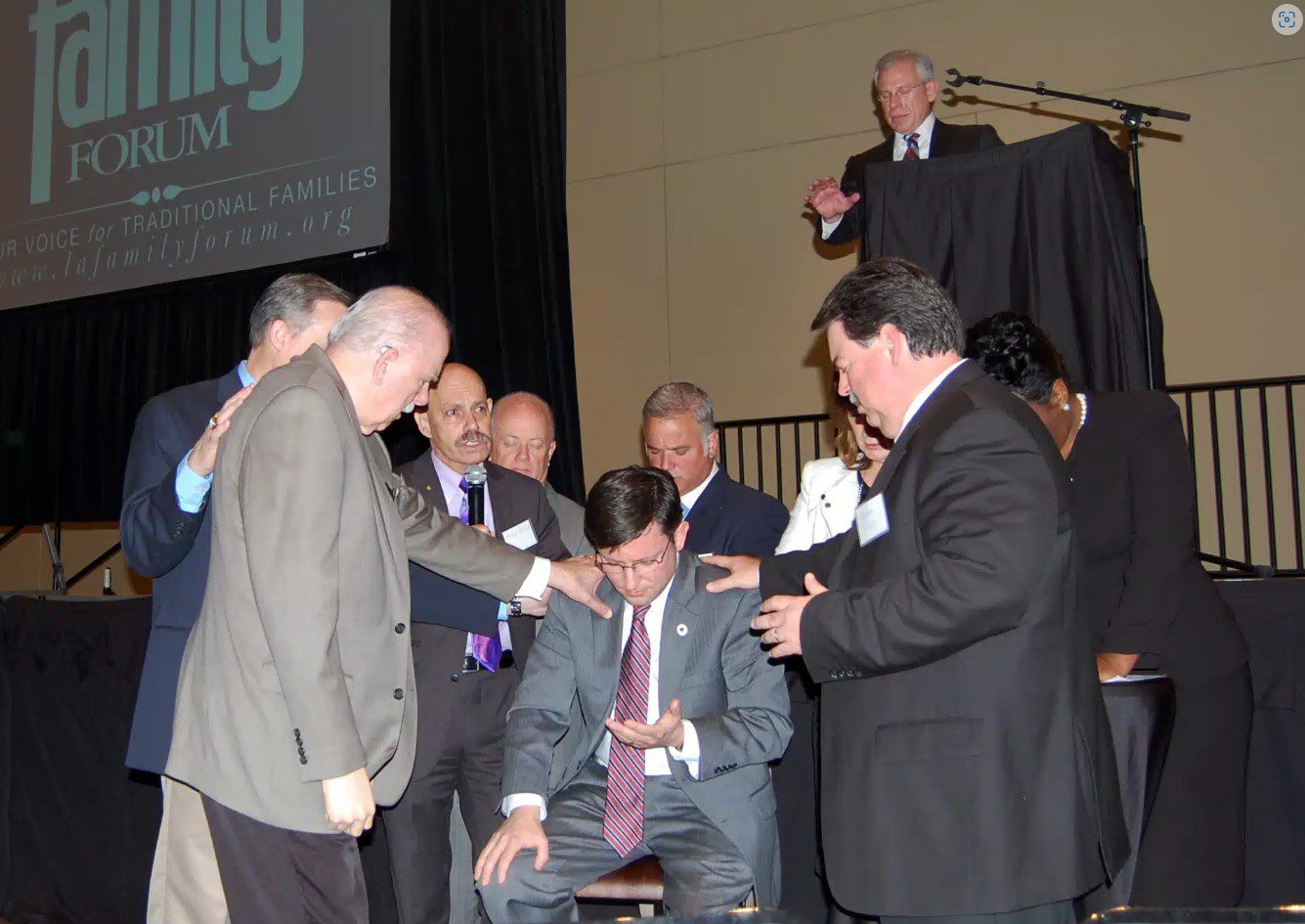 During the Louisiana Family Forum’s Pastor’s briefing following the 2016 Governor’s Prayer Breakfast in Baton Rouge, then-state Rep. Mike Johnson was prayed over by a group of pastors. At the time, Johnson had filed in the state legislature the "Pastor Protection Act," a bill that would have provided a simple protection for pastors — prevent the state from forcing religious leaders to participate in same-sex wedding ceremonies. Photo by Mark H. Hunter via Baptist Message.